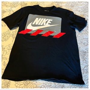 a Men’s Nike short sleeved T-Shirt. Men’s size Large.